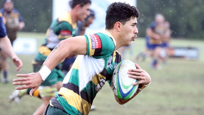 Ethan Lolesio runs the ball during Surfers Paradise’s preliminary final win over Gold Coast Eagles last year. Picture: Richard Gosling