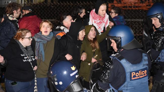 Police had to save people from a peaceful meeting. Picture: Lawrence Pinder