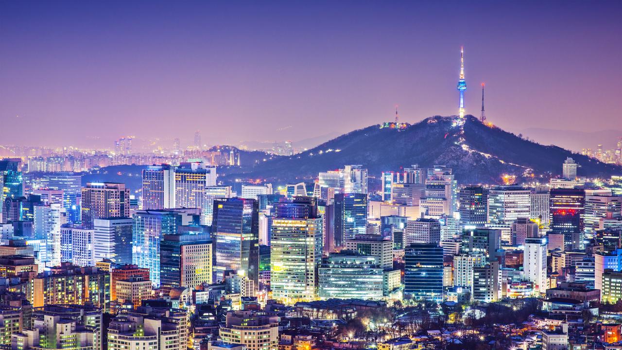 Seoul, South Korea city night-time skyline.