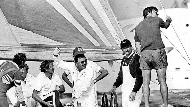 Businessman Alan Bond, skipper John Bertrand and keel designer Ben Lexcen (R), following their America's Cup victory in the yacht "Australia II" at Newport, Rhode Island in 1983.