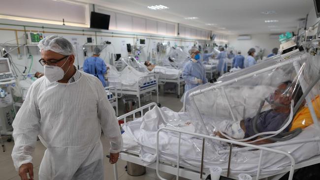 Health workers and patients in the Intensive Care Unit for COVID-19 of the Gilberto Novaes Hospital in Manaus, Brazil. Picture: AFP