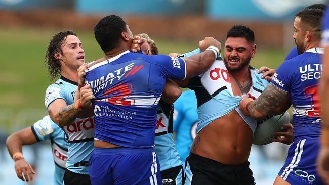 SYDNEY, AUSTRALIA - FEBRUARY 28: Royce Hunt of the Sharks and Tevita Pangai Junior of the Bulldogs tussle during the NRL Trial Match between the Cronulla Sharks and the Canterbury Bulldogs at PointsBet Stadium on February 28, 2022 in Sydney, Australia. (Photo by Mark Metcalfe/Getty Images)