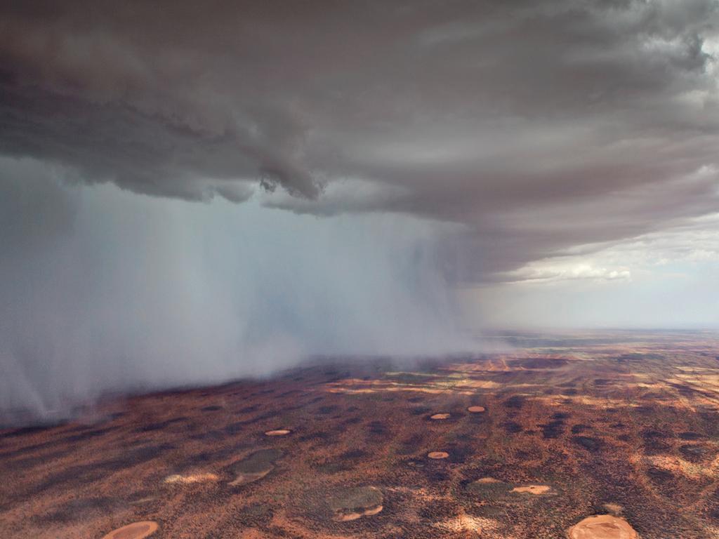 July: Isolated heavy rain over the Kennedy Range, Western Australia. Photograph: Jordan Cantelo. Jordan Cantelo was an air observer for the WA Department of Environment and Conservation during bushfires in early 2012. ‘When I was flying back along the Kennedy Range some thunderstorms fired up,’ he recalls, ‘and provided the most magnificent view for us from the helicopter’.