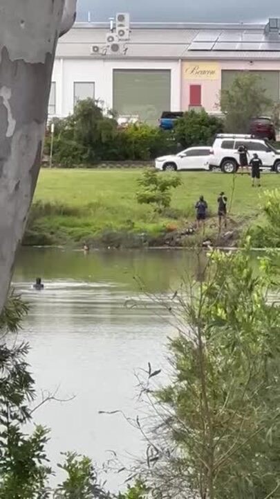 Police divers searching a lake in Pialba after a vehicle was submerged overnight.