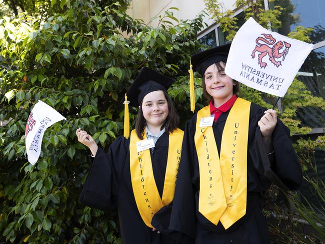 Yolla District school twins Shelby and Sheri Crocker 9 at the UTAS Graduation at Burnie. PICTURE CHRIS KIDD