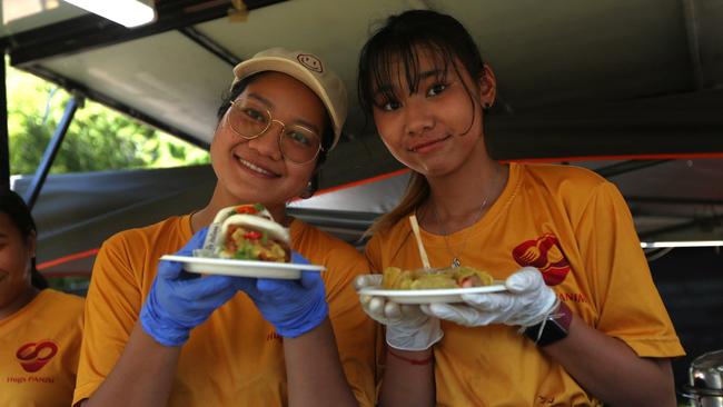 Servers at Hugs Pa Nim holding bao buns with laksa sauce at the 2024 Darwin International Laksa Festival on Sunday, November 3. Picture: Zizi Averill