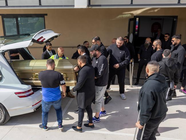 Abdulrahim’s coffin is removed from the hearse. Picture: David Geraghty