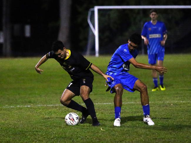 Pictured: Stratford right back Houston Jackson and Edge Hill winger Ruqi Clyde. Stratford Dolphins v Edge Hill United at Nick Brko Field - Stratford. FQPL Far North and Gulf 2024. Photo: Gyan-Reece Rocha