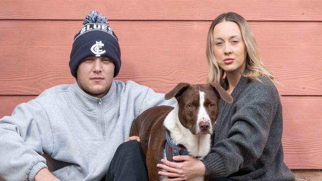 14-05-2025 Blake Bonham and Brooklyn Stott with dog Raffie who was attacked by their neighbour’s dogs. Picture: Brad Fleet