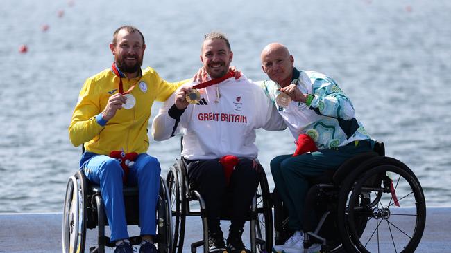 Horrie on the podium after being elevated into third. (Photo by Naomi Baker/Getty Images)