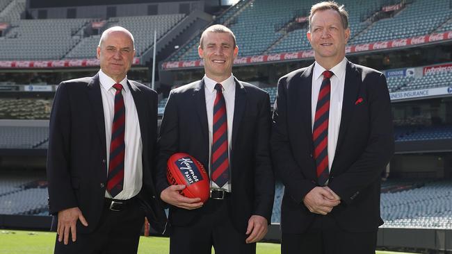 Melbourne CEO Peter Jackson, new coach Simon Goodwin and chairman Glen Bartlett.