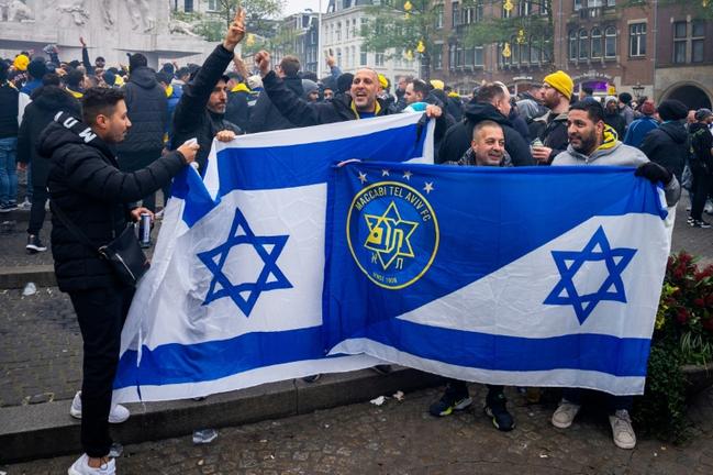 Five Maccabi fans were briefly hospitalised after being beaten up following a match with Ajax Amsterdam