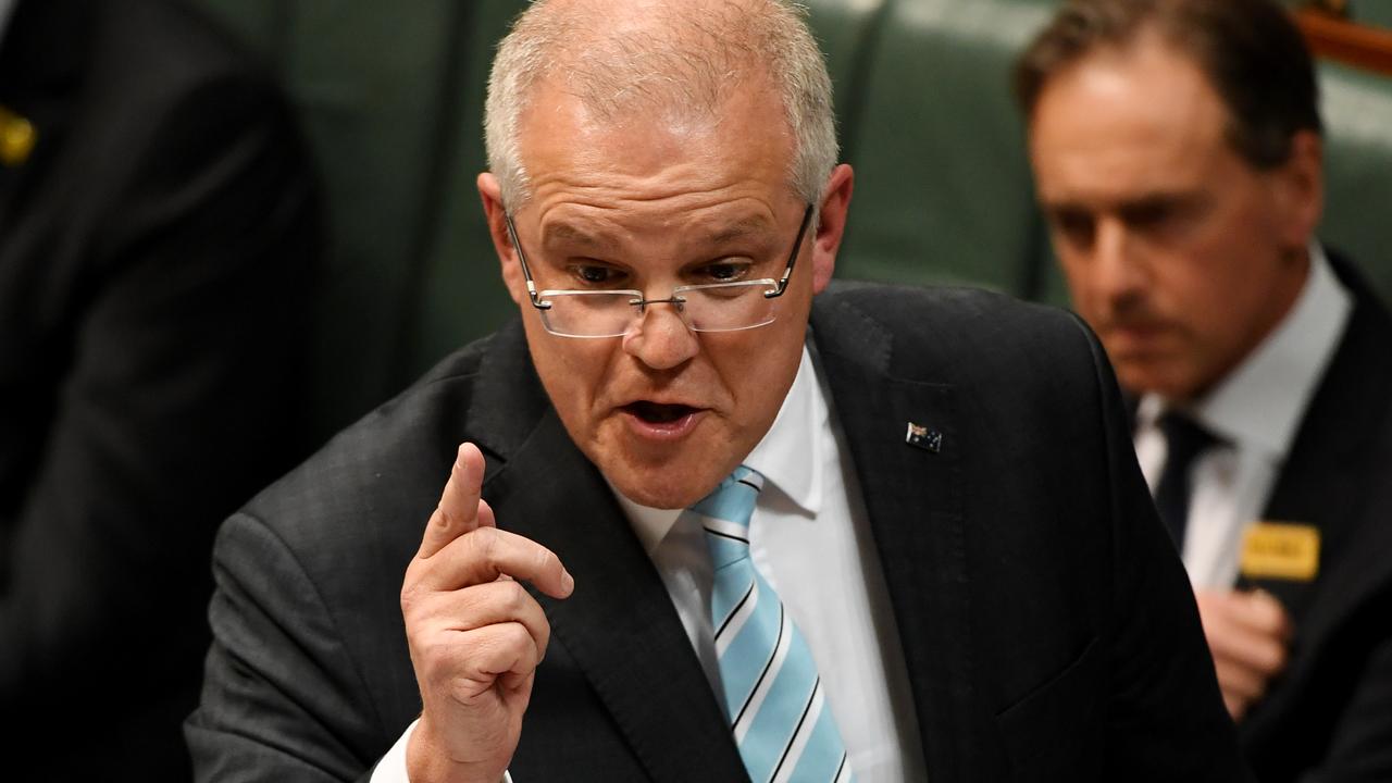 Scott Morrison defends Liberal MP Gladys Liu. Picture: Tracey Nearmy/Getty Images