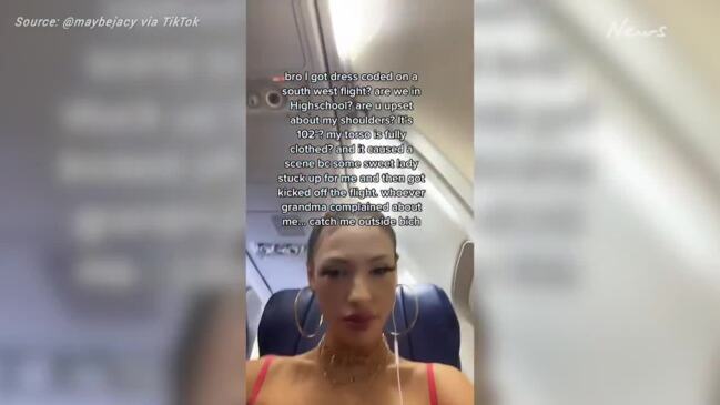 Woman 'dress-coded' on plane over racy top