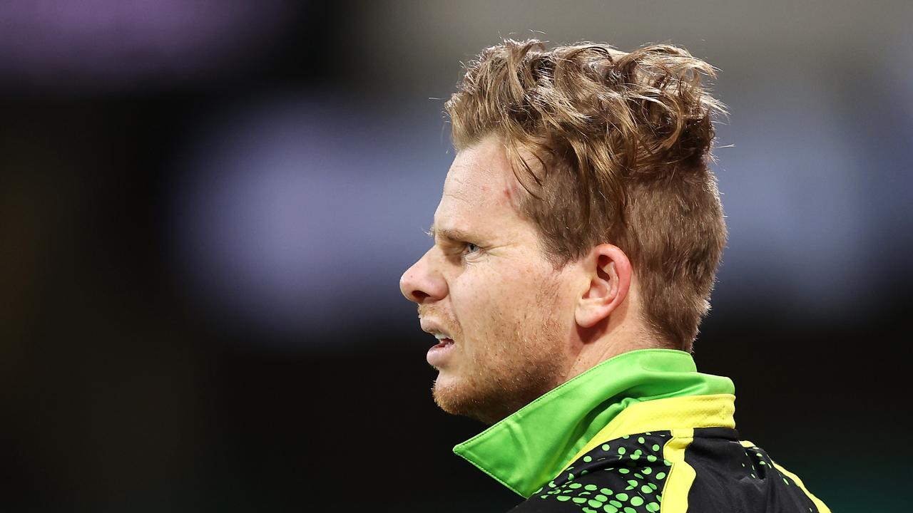 SYDNEY, AUSTRALIA - FEBRUARY 13: Steve Smith of Australia looks on after hitting his head after falling while attempting to take a catch during game two in the T20 International series between Australia and Sri Lanka at Sydney Cricket Ground on February 13, 2022 in Sydney, Australia. (Photo by Mark Kolbe/Getty Images)