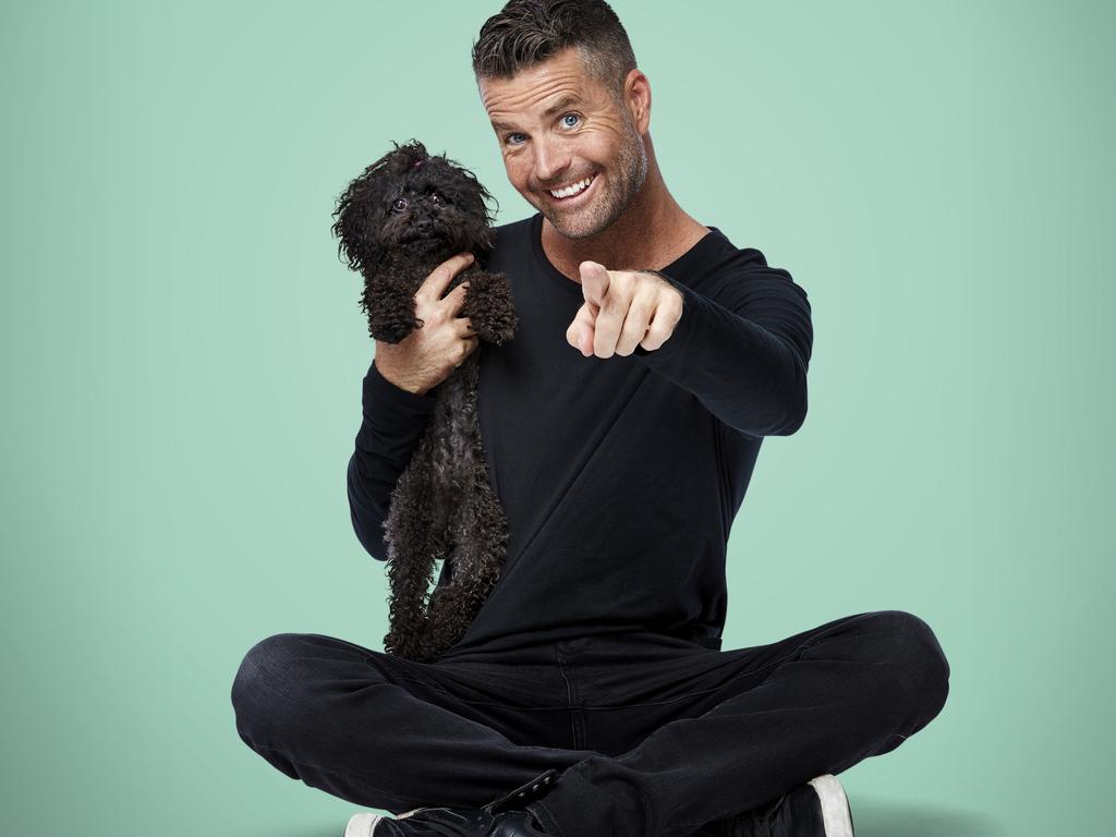 Pete Evans has launched a range of healthy pet food. Pictured, with his dog Shikoba.