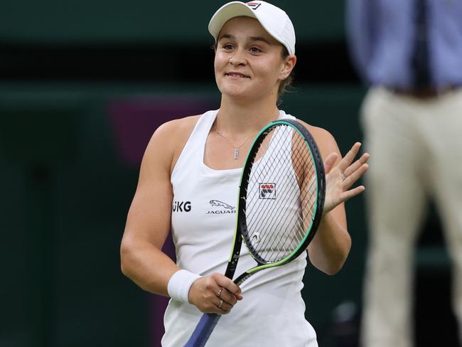 LONDON, ENGLAND - JULY 06: Ashleigh Barty of Australia celebrates victory after winning her Ladies' Singles Quarter-Final match against Ajla Tomljanovic of Australia during Day Eight of The Championships - Wimbledon 2021 at All England Lawn Tennis and Croquet Club on July 06, 2021 in London, England. (Photo by Clive Brunskill/Getty Images)