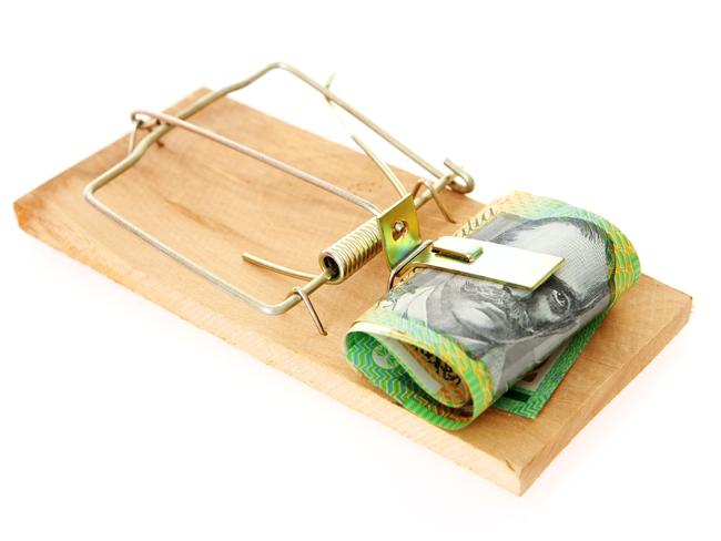 Australian money on white in a mouse trap, generic notes, cash