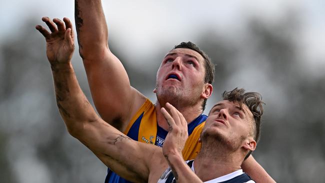 Scott Greenhough fights for the ball for Deer Park against and Hoppers Crossing’s Harley Armstrong-Weston in 2022. Picture: Andy Brownbill