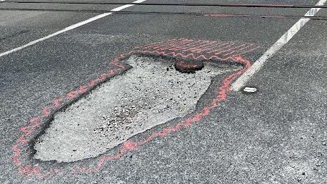 A massive pothole on the Bruce Highway south of Mackay along the Bruce Highway. Picture: Mitchell Dyer