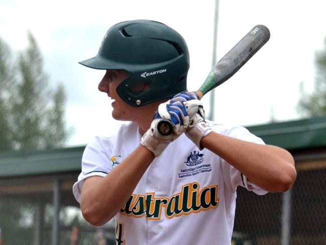 Mackay softballer Riley James playing for Australia at the Junior Mens Softball World Championship in Canada.