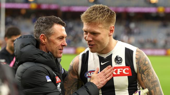 Magpies coach Craig McRae talks with Jordan De Goey. Picture: Paul Kane/Getty Images