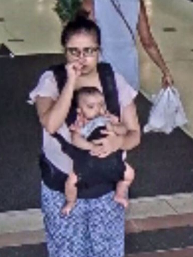 CCTV from a Buranda shopping centre shows the mum and bub on November 15.