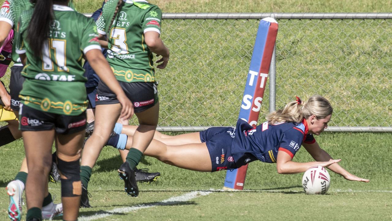 Jessica Fitzgibbons scores a try for Clydesdales last season - she scored two tries today.Picture: Nev Madsen.