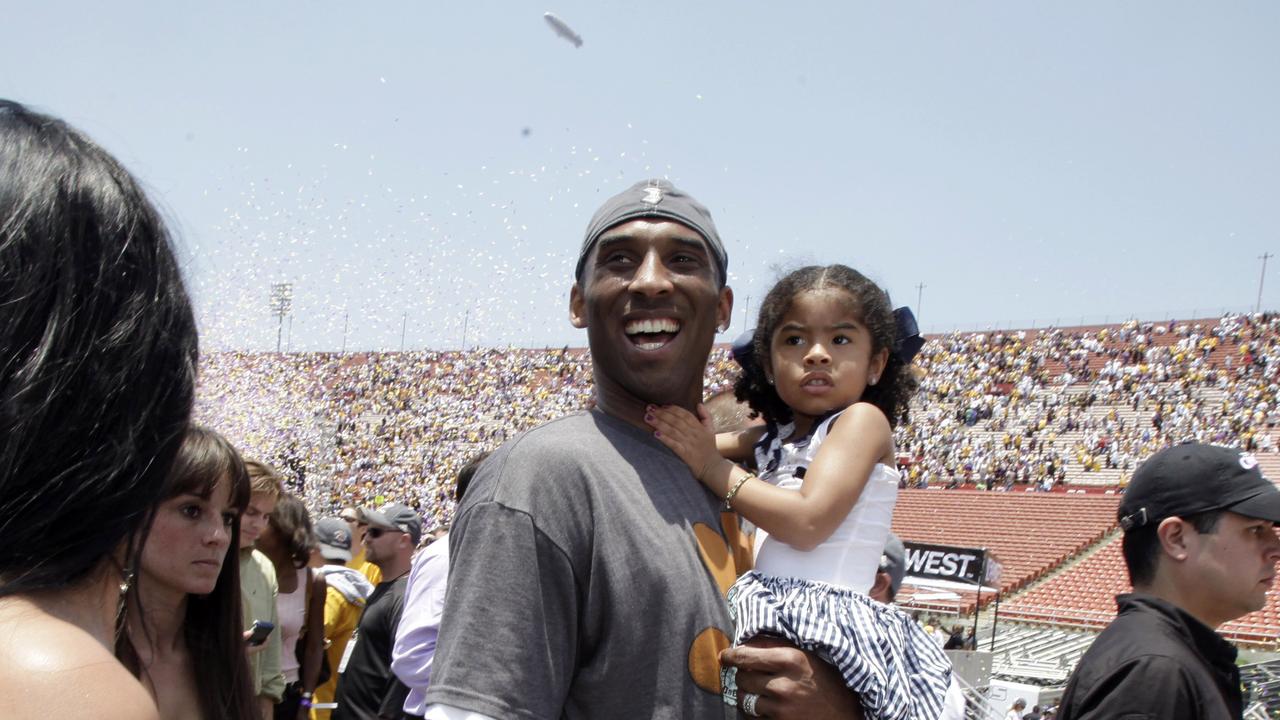 Kobe and Gigi at the championship parade in 2009. Picture: Jae C Hong/AP