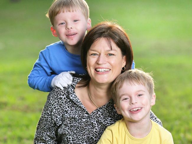 Melanie Funk and her twins Matthew and Harry who suffer from severe eczema.