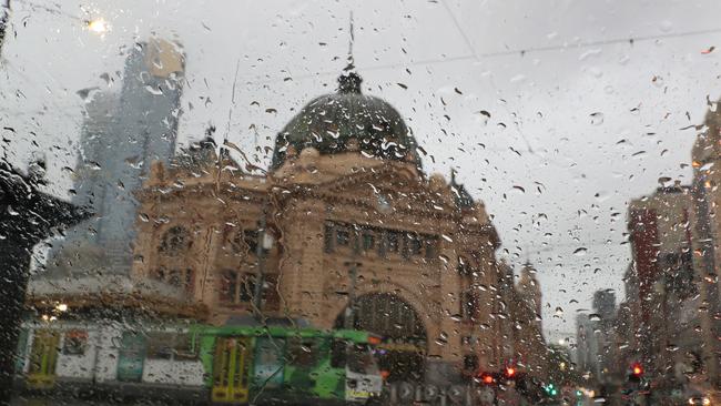 Rain falls across Melbourne on Monday. Picture: David Crosling