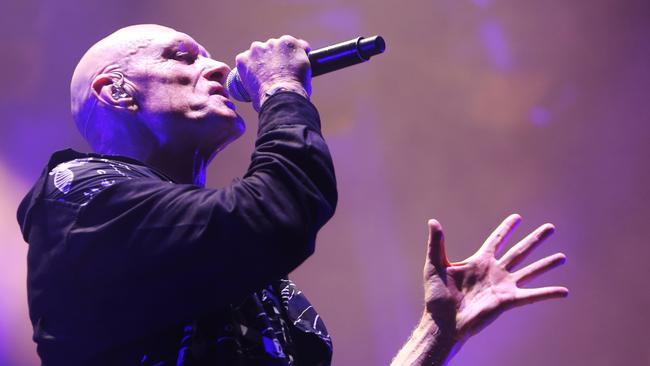 Singer Peter Garrett performs during a Midnight Oil Concert at The Domain in Sydney, Saturday, November 11, 2017 prior to ambushing Wil Wagner.