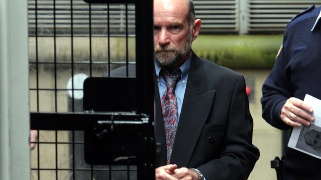 Peter Joseph Kelly being led into a prison van at the rear of the Supreme Court’s King Street building in 2012.