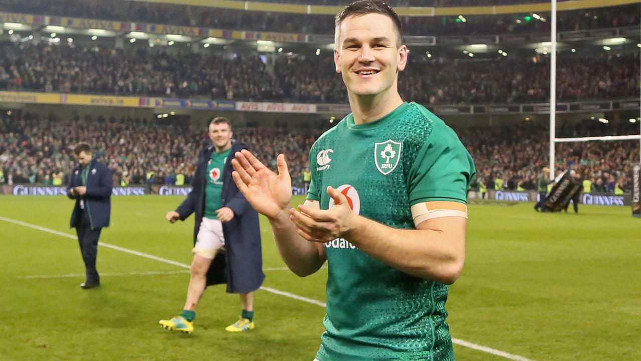 Ireland’s fly-half Jonathan Sexton and teammates do a lap of honour at the Aviva.