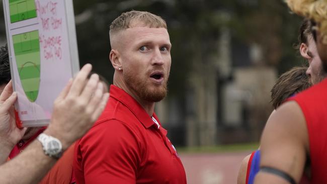 Port Melbourne Colts coach Josh Caddy will return to the field in the coming weeks. Picture: Valeriu Campan