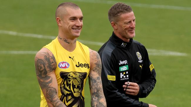 MELBOURNE, AUSTRALIA - MARCH 04: Dustin Martin shares a laugh with Coach Damien Hardwick during a Richmond Tigers AFL captain's run at The Swinburne Centre on March 04, 2021 in Melbourne, Australia. (Photo by Jonathan DiMaggio/Getty Images)