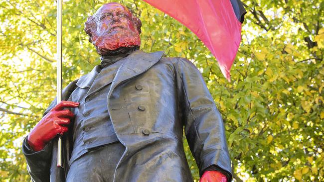 The William Crowther statue during a recent ‘reinterpreation’ by Tasmanian Aboriginal Artist Allan Mansell. Picture: Chris Kidd