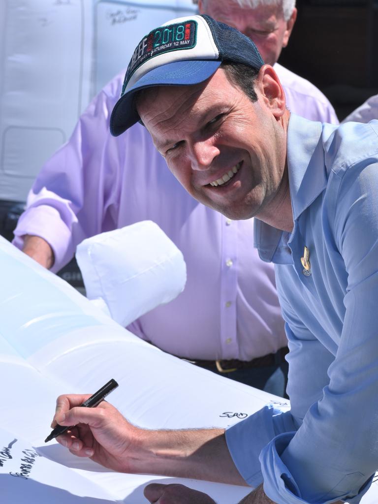 Senator Matt Canavan signs the inflatable pledge car for Rural Road Safety Month.