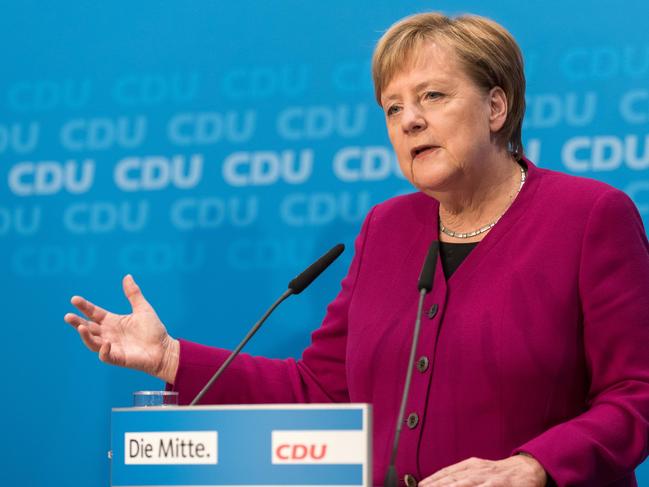 German Chancellor and leader of the Christian Democratic Union (CDU) Angela Merkel speaks during a press conference at the CDU headquarters on October 29, 2018 one day after the regional state elections in Hesse. - German Chancellor Angela Merkel announced she will not stand again as leader of her centre-right CDU, which she has chaired the CDU for 18 years, and step down as German chancellor when her mandate ends in 2021, making way for a successor following a series of regional vote defeats. (Photo by Markus HEINE / AFP)