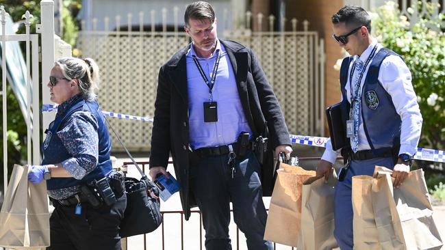 Major Crime officers remove bags of evidence during the investigation into the double murder of Antoinette Tozer, 76, and her son Steve, 55. Picture: Mark Brake