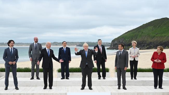 Together apart: world leaders gather in a socially-distanced manner at the G7 summit.