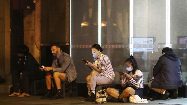 People lined up outside Centrelink’s Darlinghurst office before the sun had even come up on Wednesday morning. Picture: John Grainger