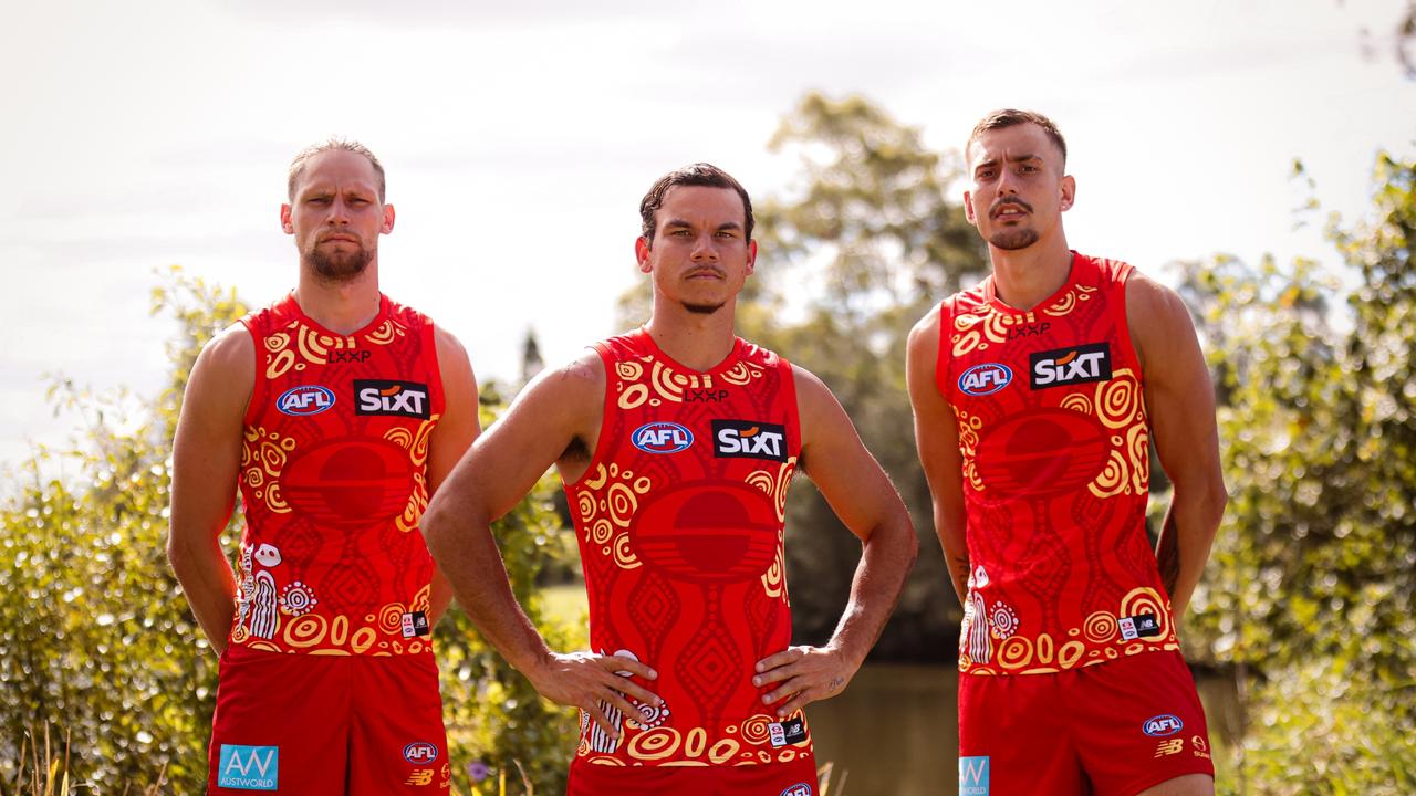 Jy Farrer, Dan Rioli and Joel Jeffrey in the Gold Coast Suns' special edition Darwin/Larrakia Indigenous Guernsey for the two Darwin matches.