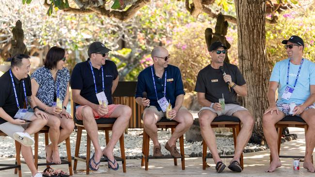 Employment Hero chief executive Ben Thompson takes the microphone during talks with staff in Bali.