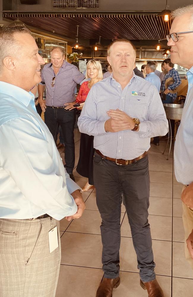 Prime Minister Scott Morrison chats with Tourism Top End general manager Glen Hingley (centre) and Darwin Convention Centre general manager Peter Savoff (left) in Darwin. Picture: Gary Shipway