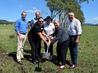 Lismore Chamber of Commerce co-president Sarah Smith and Lismore City Council general manger Shelley Oldham turn the first sod of the $8.2 million flood mitigation project in South Lismore. Picture: Aisling Brennan