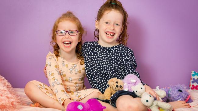 Grace, 7 with her sister Emma, 4. Grace attends the Trinity Kids program that intills confidence and builds emotional intelligence. Picture: Sarah Matray