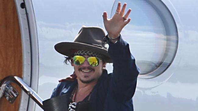 Johnny Depp at the Brisbane Airport. Pic Annette Dew