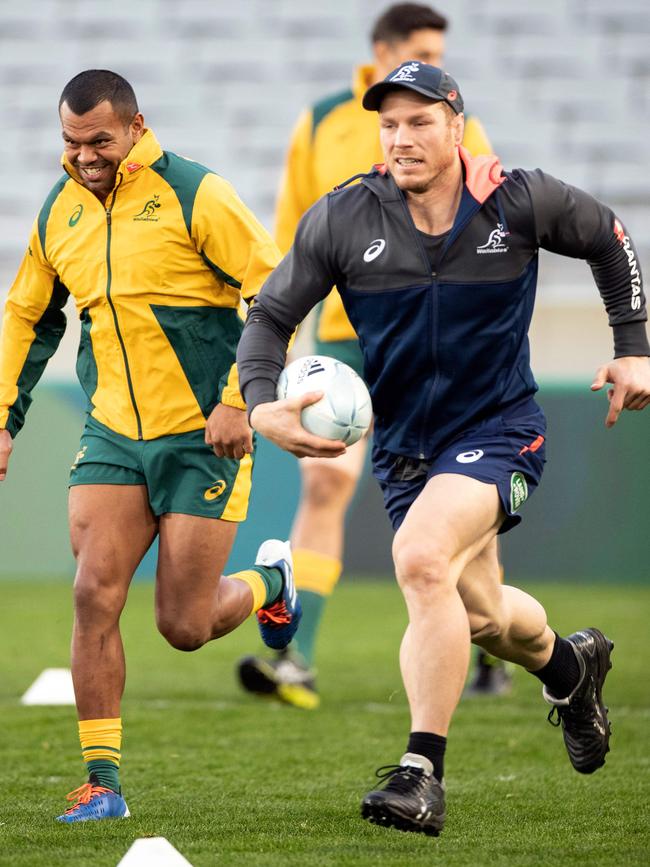 Australia's Kurtley Beale (L) and David Pocock (R) attend the captain's run training session with teammates in Auckland on August 16, 2019, ahead of a Bledisloe Cup game against the New Zealand's All Blacks. Picture: Greg Bowker/AFP