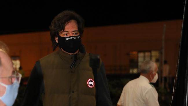 AFL boss Gillon McLachlan prepares to board the flight to Queensland.